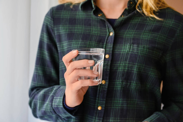 Woman holding glass of fresh water, closeup - Photo, Image