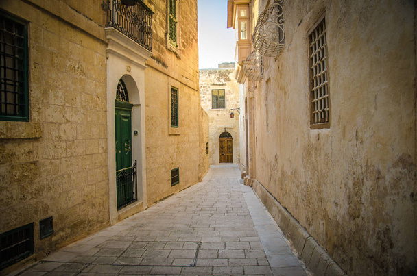 Historic old medieval narrow streets and architecture buildings in Imdina, Malta - 写真・画像