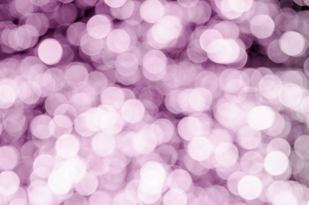 Shiny bokeh purple background. Round defocussed transparent lights. - Foto, afbeelding