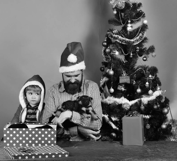 Christmas present - happy child boy and bearded father - Zdjęcie, obraz