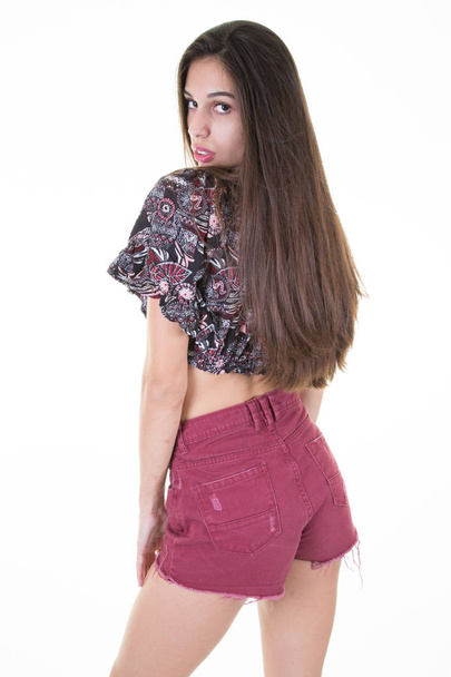 takana näkymä pitkät hiukset brunette tyttö muoti vaatteet
 - Valokuva, kuva