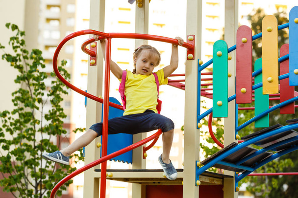 little girl playing in the park   - Фото, зображення