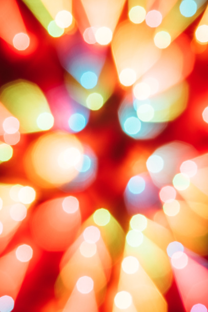 Fond de Noël avec Bokeh coloré et lumières vives  - Photo, image