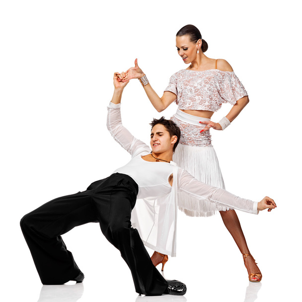 Sensual couple dancing salsa. Latino dancers in action. Isolated - Photo, Image