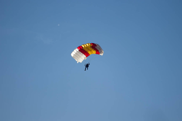 parachutist doing acrobatics in air - Fotó, kép