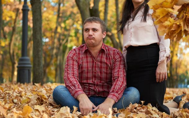 Man tired in autumn city park. Unhappy emotion. - Photo, Image