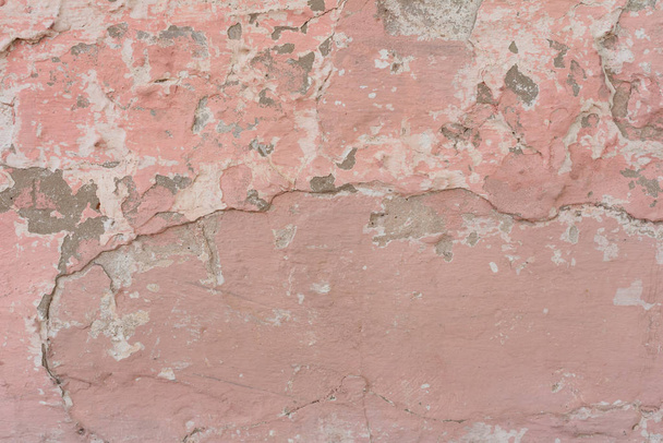 Wall fragment with scratches and cracks. It can be used as a background - Foto, imagen