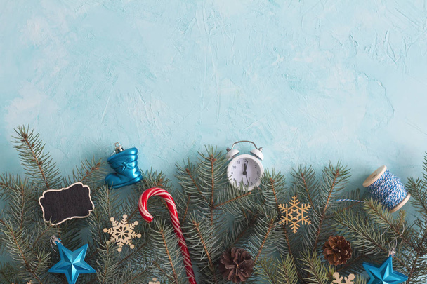 Christmas objects on the blue background top view. Christmas background - Фото, изображение