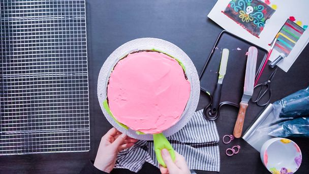 Step by step. Flat lay. Baker frosting multilayer chocolate cake with buttercream frosting. - Φωτογραφία, εικόνα