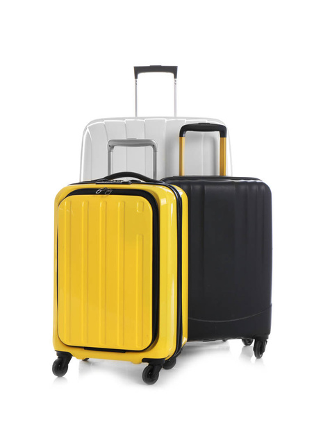 Modern suitcases for travelling on white background - Fotoğraf, Görsel