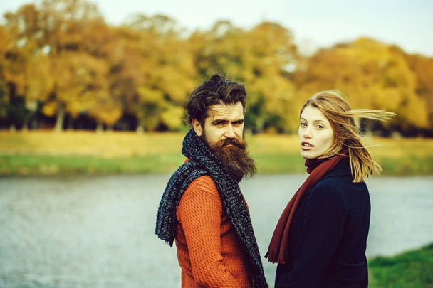 Young couple in autumn park - 写真・画像
