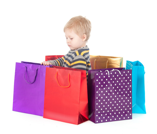 attractive boy with shopping bags - 写真・画像