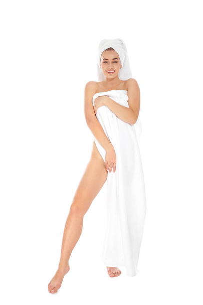 Full length portrait of young pretty woman with towels on white background - Foto, afbeelding