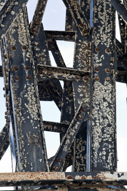 Salt damaged rusty metal beams with run down bolts. - Photo, Image