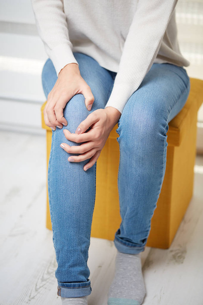 Physical injury of leg / knee / joint - woman holding painful part body. - Φωτογραφία, εικόνα