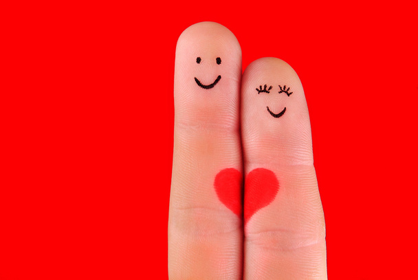 šťastný pár koncept - muž a žena objetí, malované na prsty - Fotografie, Obrázek