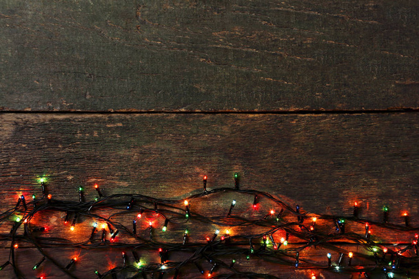 Guirlande de Noël lumières sur table en bois gris
 - Photo, image