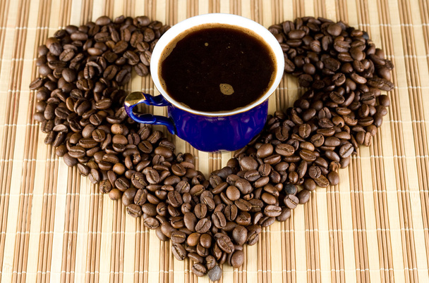 Coffee cup and coffee beans - Фото, зображення