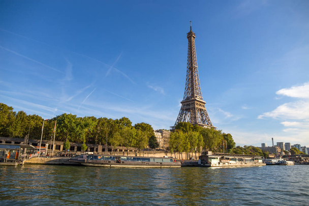 PARIS, FRANCE, SEPTEMBER 8, 2018 - The Eiffel Tower from the river Seine in a sunny day in Paris, France - Fotoğraf, Görsel