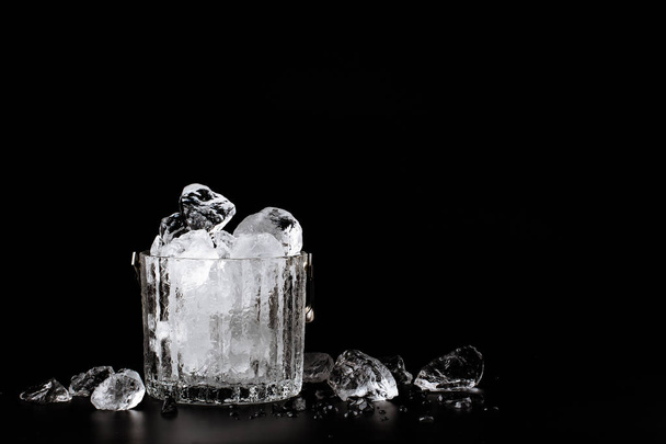 crystal bucket with ice on a dark background - Fotoğraf, Görsel