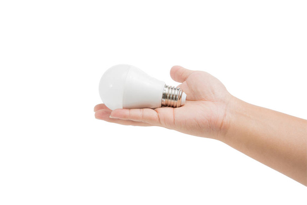 LED Electric lamp in young man's hand holding isolated on white background. - Foto, imagen