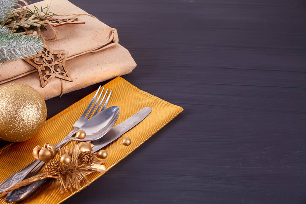 Christmas table setting with cuttlery and decoration on wooden table. Christmas background. - Φωτογραφία, εικόνα