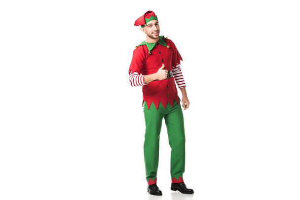 man in christmas elf costume doing thumbs up sign isolated on white - Foto, Imagen