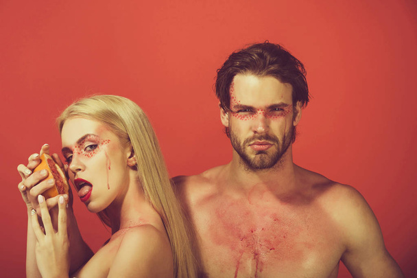 woman and man with makeup hold grapefruit - Photo, Image