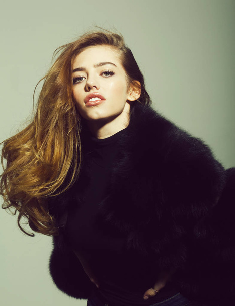 pretty sexy woman or girl with long hair in fur - Photo, Image