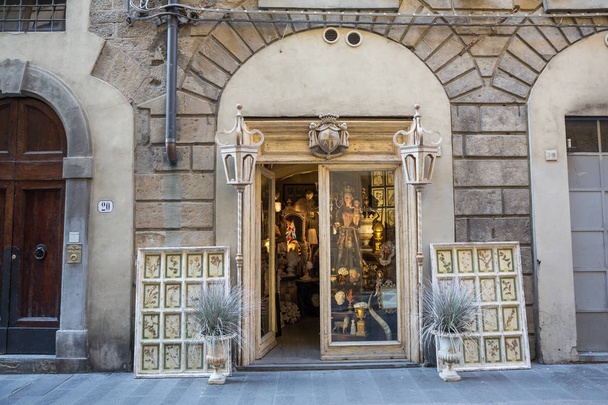 Florence, Italy July 3rd, 2015:  Antique shop fascia in a side street in Florence, Italy - 写真・画像