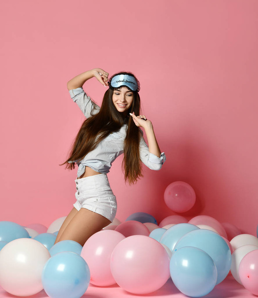 beauty, people, style, holidays and fashion concept - happy young woman or teen girl in pink dress with helium air balloons, Celebration and party. - Фото, изображение