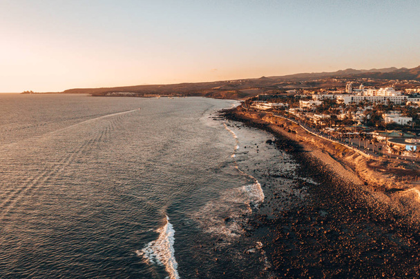 Aerial view of the Gran Canaria island during sunset. Beautiful beach near Maspalomas dunes and Meloneras district.  - Фото, изображение