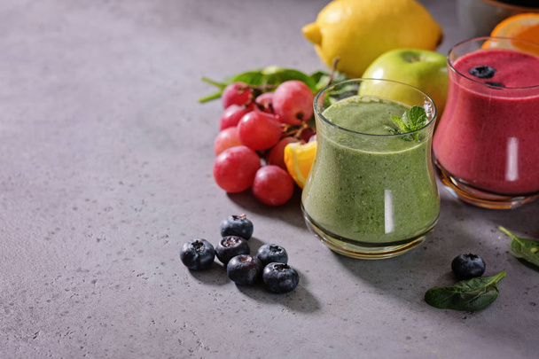 Colorful smoothie, healthy detox vitamin diet. Vegan drinks with fresh fruits - Фото, зображення