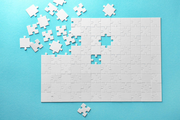 Jigsaw puzzle on color background - Photo, Image