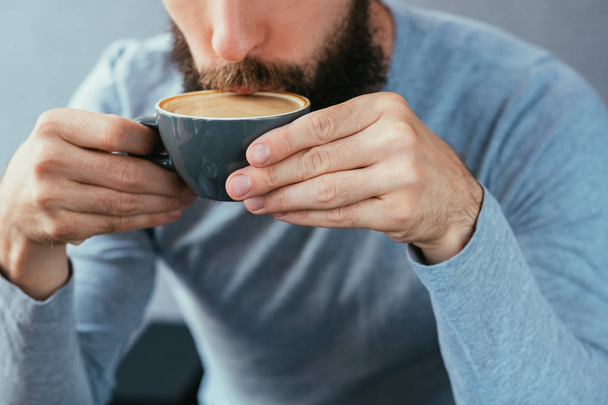 man drink coffee traditional hot cappuccino mug - Фото, зображення