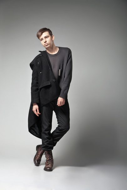 Fashion Shot of a young man in coat - Photo, Image