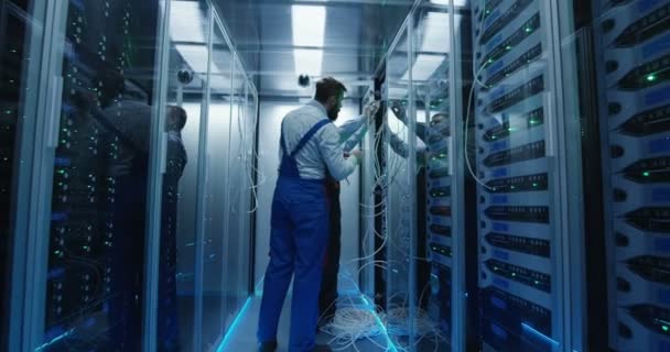 Two men working in a data center - Footage, Video