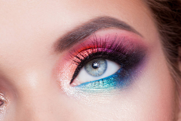 Bright eye makeup. Pink and blue color, colored eyeshadow. - Фото, зображення