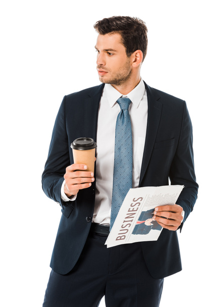 confident businessman standing with business newspaper and coffee to go isolated on white - Foto, immagini