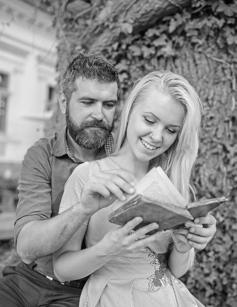 Couple in love, teacher and student reading, - Фото, изображение