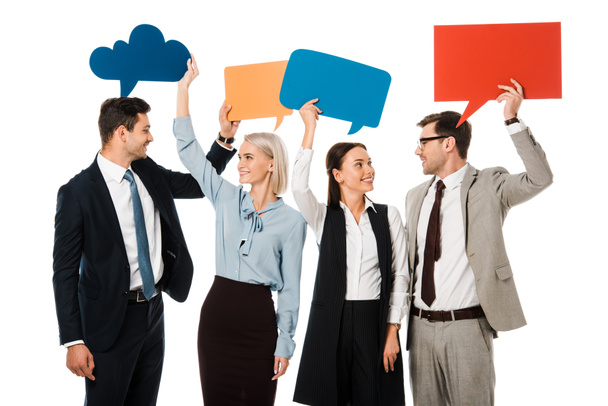 cheerful business team holding colorful speech bubbles isolated on white - Photo, Image