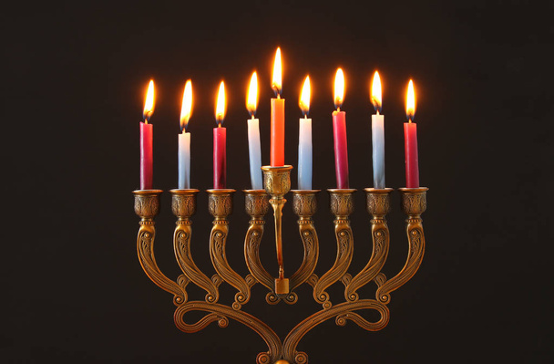 image of jewish holiday Hanukkah background with menorah (traditional candelabra) and candles - Fotografie, Obrázek