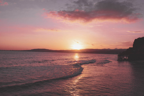 Blick auf den Strand bei Sonnenuntergang - Foto, Bild