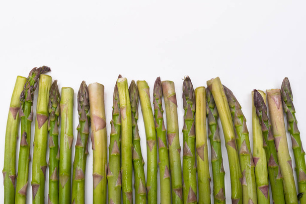 green asparagus isolated on white background copy space - 写真・画像