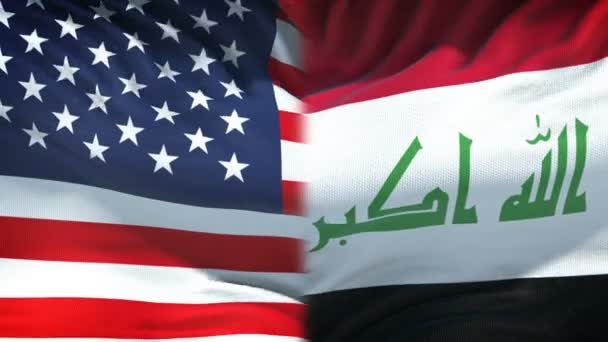 United States and Iraq flags background, diplomatic and economic relations - Footage, Video
