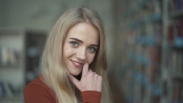 Beautiful girl flirts in front of the camera - Materiaali, video