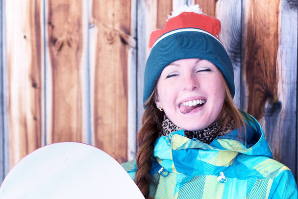 Snowboard ile oynak kız - Fotoğraf, Görsel