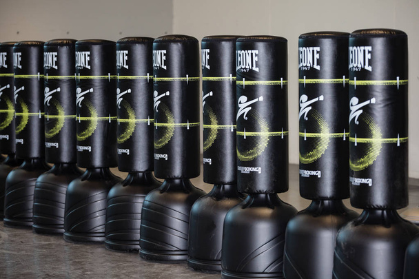 Group of Black Punching Bag in Line for Kickboxing and Fitness Exercise. - Photo, Image