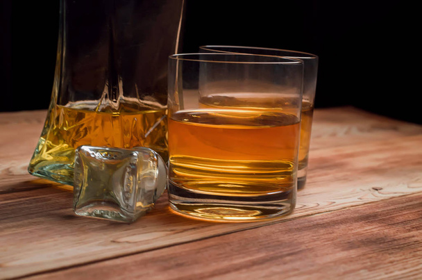 Glasses for whiskey on a wooden table - Foto, Imagem
