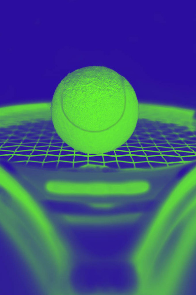 Closeup on ball on a tennis racket - 写真・画像